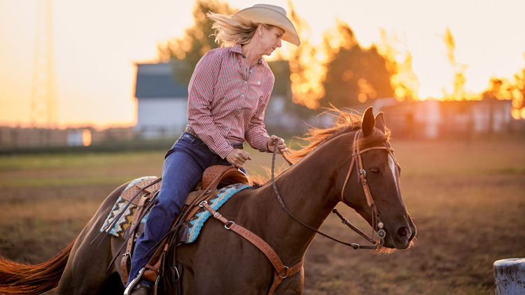 WPRA barrel racer Sherry Cervi practicing barrels on her horse.
